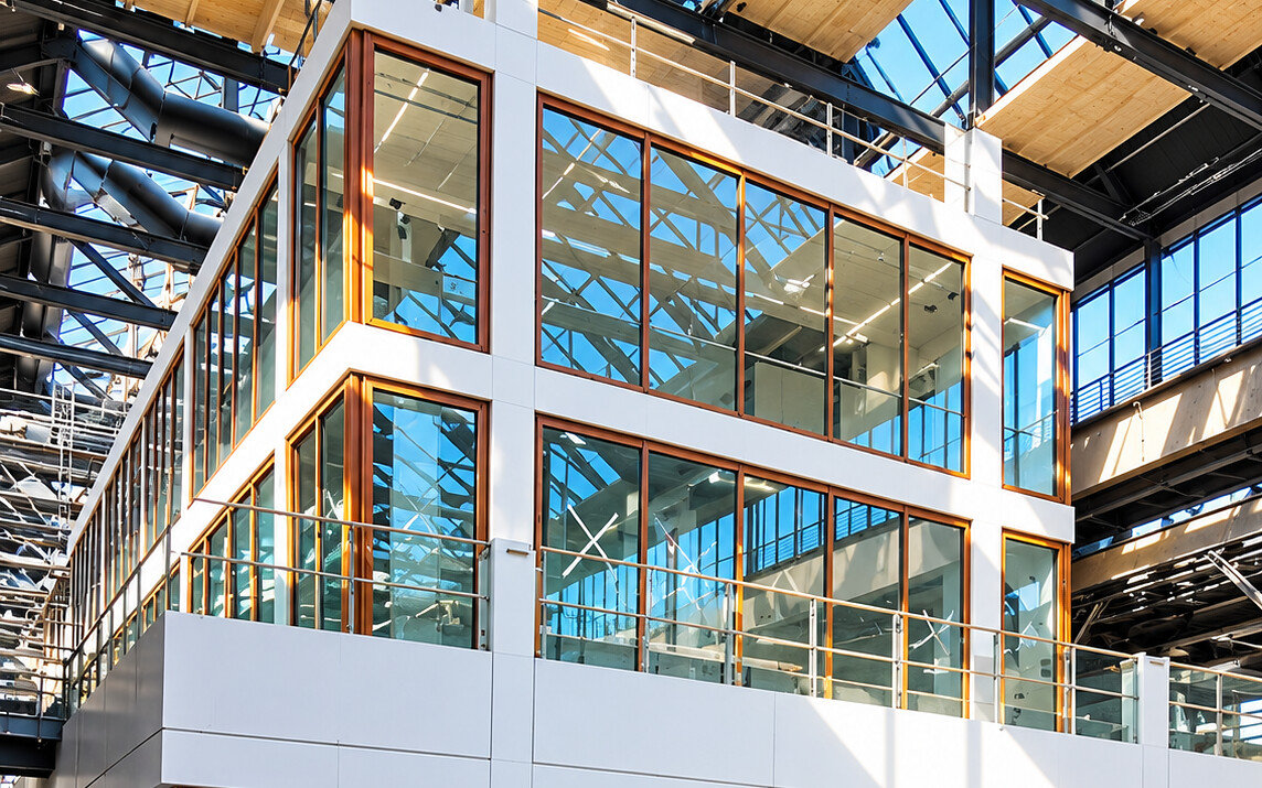 Glass structure built inside the Van Gendt Hallen, the former Werkspoor factory hall in Amsterdam